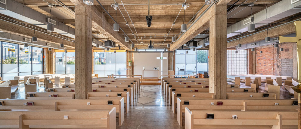 Interior of All Saints Church, Dallas, which revitalized a century-old care dealership as a sacred space_Photo Robert Tsai Photography