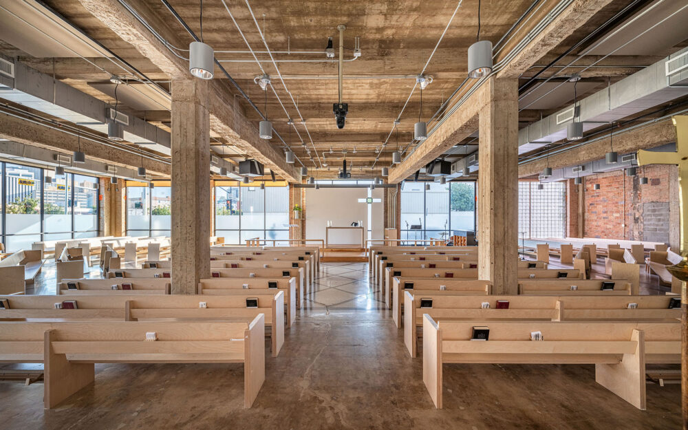 Interior of All Saints Church, Dallas, which revitalized a century-old care dealership as a sacred space_Photo Robert Tsai Photography